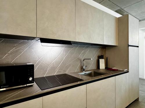 Una cocina o cocineta en 1Dest - Rock'n'River - Flat