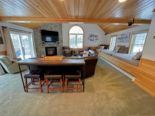 a living room with a table and a living room with a couch at HL96 Single family home with views and lots of space Privacy convenience AC and style in Carroll