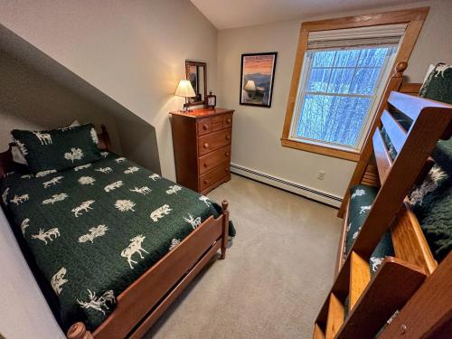 a bedroom with a bed and a dresser and a window at HL96 Single family home with views and lots of space Privacy convenience AC and style in Carroll