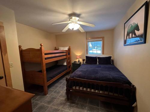 a bedroom with a bed and a ceiling fan at HL96 Single family home with views and lots of space Privacy convenience AC and style in Carroll