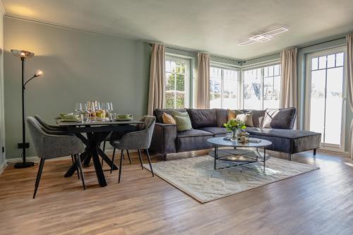Ruang duduk di NEU! Ferienwohnung Düne & Wind