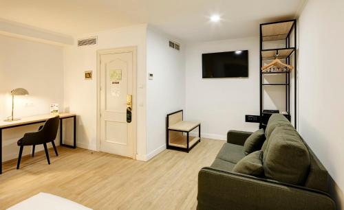 Телевизор и/или развлекательный центр в Sercotel Las Casas de los Mercaderes