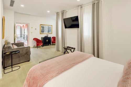 Телевизор и/или развлекательный центр в Sercotel Las Casas de los Mercaderes