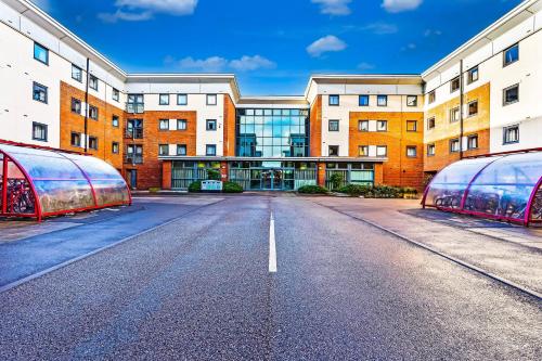 an empty street in front of a building at Crewe City Centre in Crewe