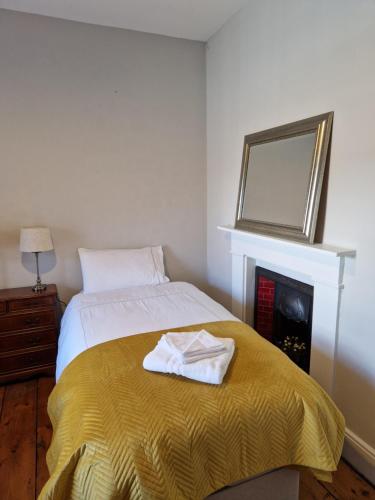 Letto o letti in una camera di The Forum - Mountmellick - Church