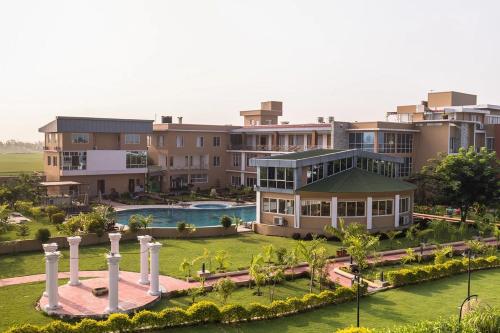 an aerial view of a resort with a pool at Palette 823 Hotel Ichchha in Simara