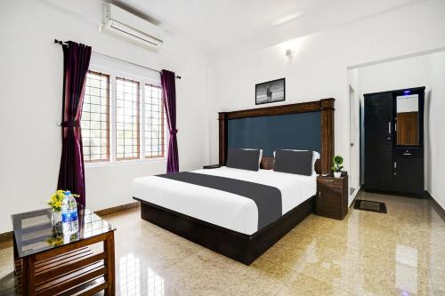 ムンナルにあるHotel O Stay Maxのギャラリーの写真