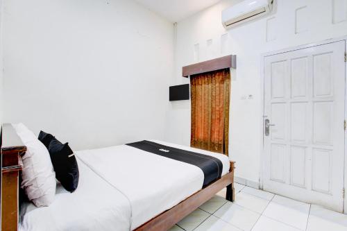 Фотография из галереи Hotel O Hotel Terang Bulan в Пекалонгане
