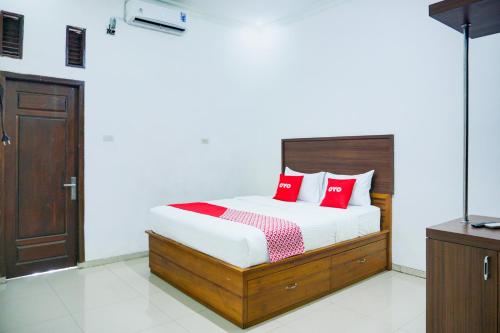 Letto o letti in una camera di Hotel O Teluk Betung Near Water Park Lembah Hijau Formerly Kanajiwa Guesthouse 2