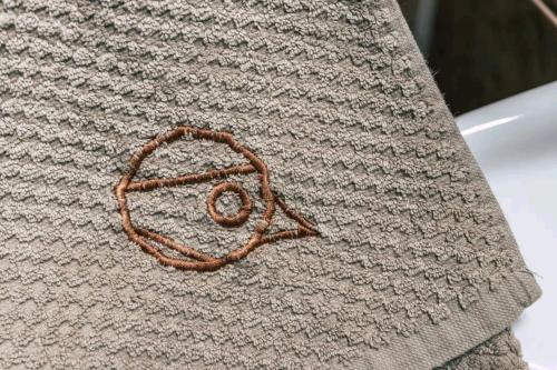 a crocheted hat with a peace sign on it at Chata Margit - Margit-lak in Szalóc