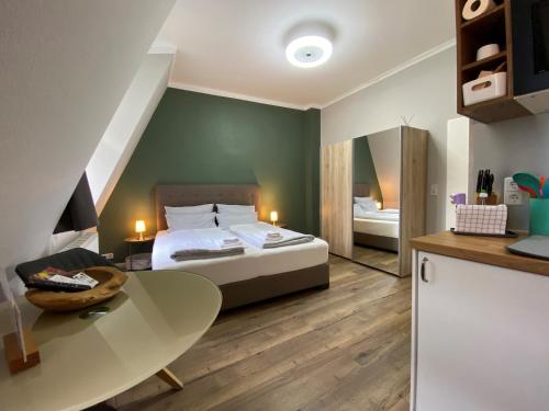 Foto Amaroo - Rooms & Apartments "Charlotte" 1