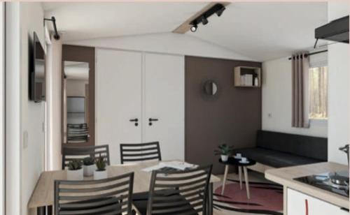 Kuchyň nebo kuchyňský kout v ubytování Camping maeva Escapades du Château de l'Hom