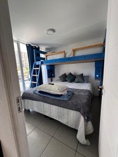 Postel nebo postele na pokoji v ubytování Arriendo diario iquique