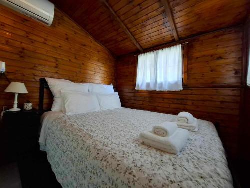 Postel nebo postele na pokoji v ubytování Levantes Garden House -