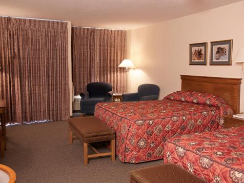 Voodi või voodid majutusasutuse Bear Lodge toas