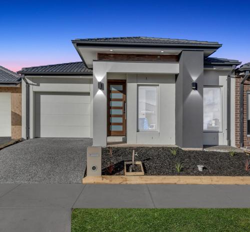 a rendering of a house with a garage at Amukta nook in Truganina