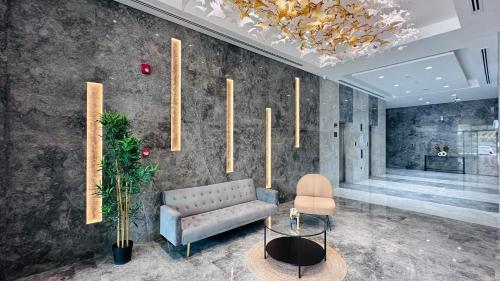 Posezení v ubytování Sunday Sheikh Zayed Road Concord Tower 1 BR by Belvilla