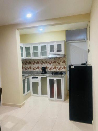 Kuchyň nebo kuchyňský kout v ubytování Apartamento Familiar 7