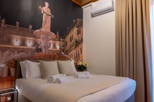 Letto o letti in una camera di PALAZZO RISTORI