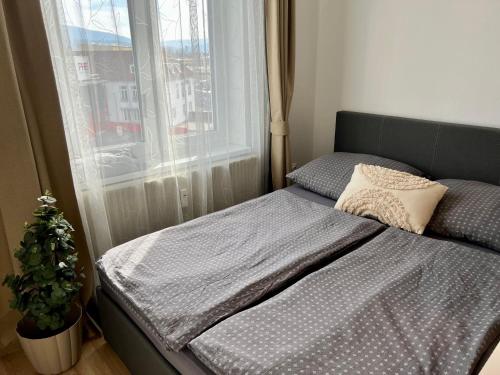 Ένα ή περισσότερα κρεβάτια σε δωμάτιο στο Apartment Near Red Bull Ring