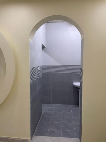 a bathroom with a shower with a sink at Dafyat two bedrooms rental house in Dafīyāt