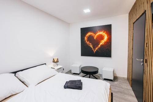 Postel nebo postele na pokoji v ubytování Apartmány U Doskočilů