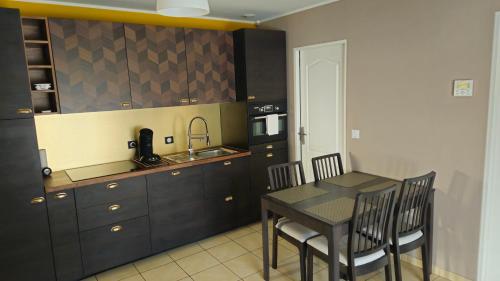 Una cocina o cocineta en Hédoniste 1