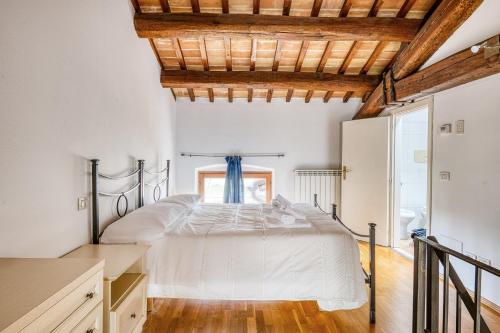 Katil atau katil-katil dalam bilik di Quiet and peaceful apartment - Perugia