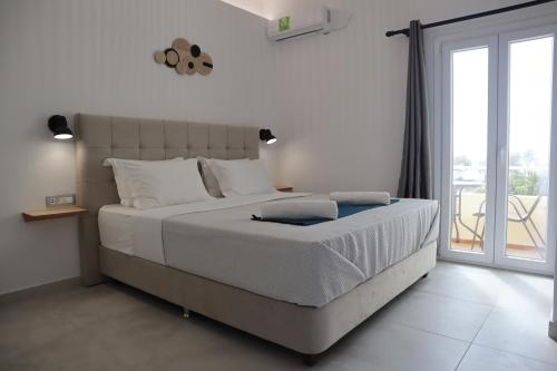 Ένα ή περισσότερα κρεβάτια σε δωμάτιο στο Pension St.George Rooms & Studios