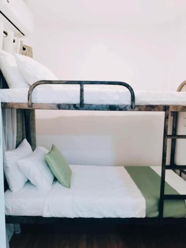 Postel nebo postele na pokoji v ubytování De Richness
