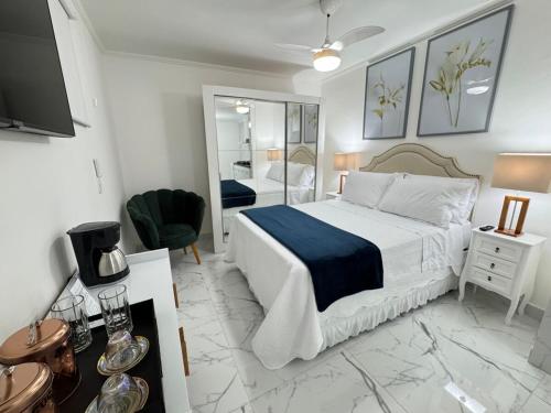 Ένα ή περισσότερα κρεβάτια σε δωμάτιο στο Best of Bom Retiro-Tiradentes Metro apt 20