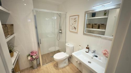 Et badeværelse på Apartamento Lindamar