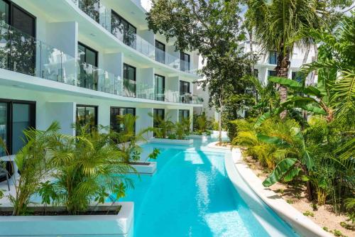 an image of a swimming pool in a building at Central park lagunas in Tulum