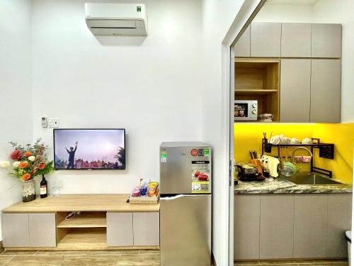 Kuchyň nebo kuchyňský kout v ubytování 2 Phòng Ngủ Riêng Biệt Cho Hộ Gia Đình 4 Người