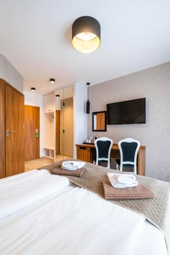 Ένα ή περισσότερα κρεβάτια σε δωμάτιο στο Amber Park Spa