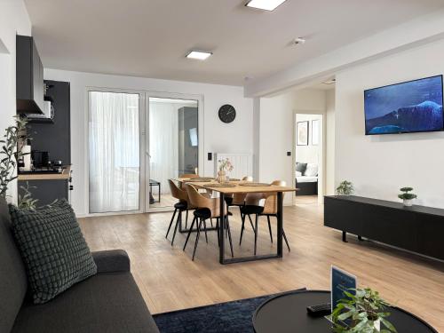 Μια τηλεόραση ή/και κέντρο ψυχαγωγίας στο Central Bonn Apartments I private parking I home2share