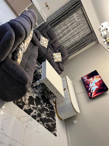 an overhead view of a living room with a couch at Caster two bedrooms apartment jkia in Nairobi