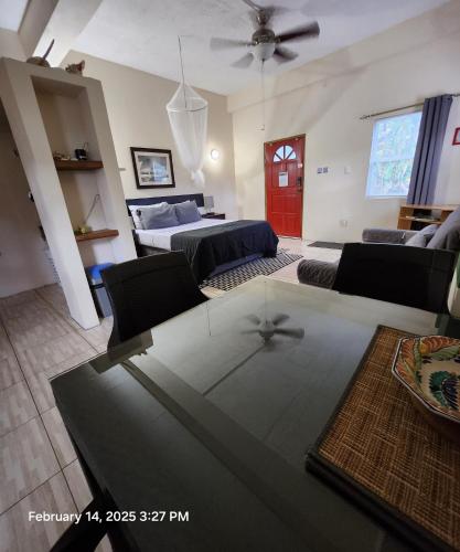 a living room with two beds and a couch at Carolina Point Resort in Crown Point