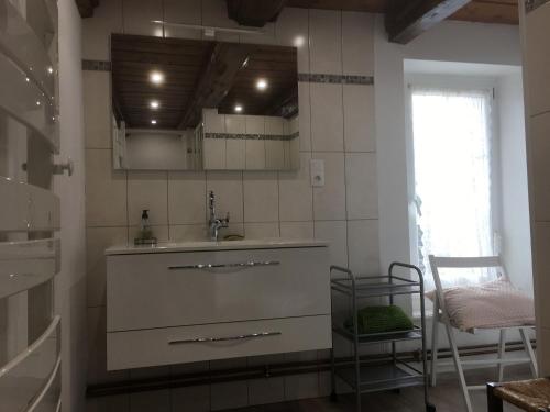 a kitchen with a sink and a counter top at Maison typique lorraine dans une ancienne ferme - FR-1-584-376 in Grand-Failly