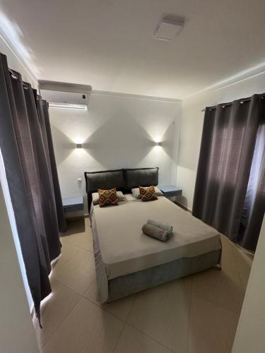 Cama o camas de una habitación en CA AMARELA WI-FI FREE Sal Rei Boa Vista