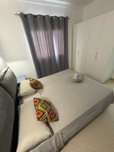 Cama o camas de una habitación en CA AMARELA WI-FI FREE Sal Rei Boa Vista