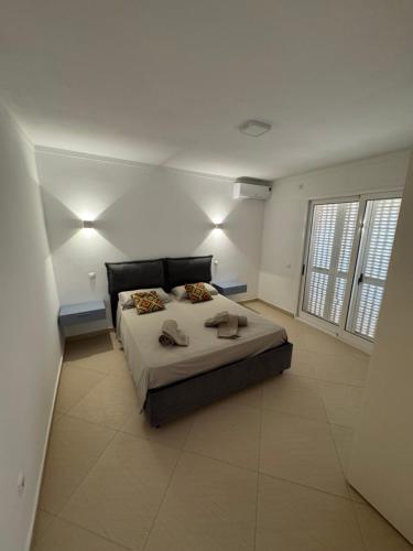 Cama o camas de una habitación en CA AMARELA WI-FI FREE Sal Rei Boa Vista