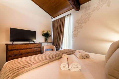 Letto o letti in una camera di PALAZZO RISTORI