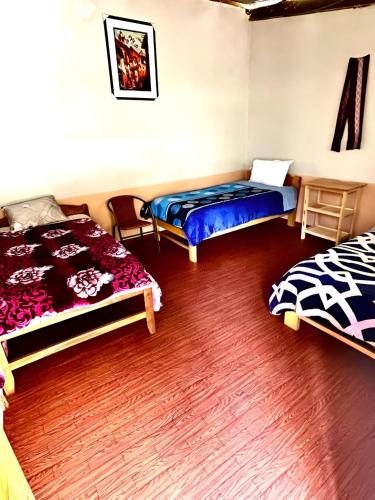 Postel nebo postele na pokoji v ubytování Hospedaje el Mirador