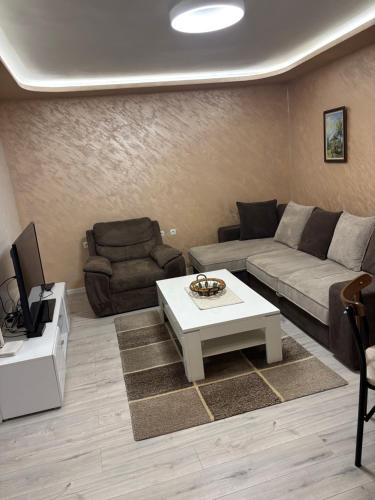 Un lugar para sentarse en Max Apartments