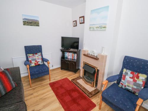 TV a/nebo společenská místnost v ubytování Daffodil Cottage