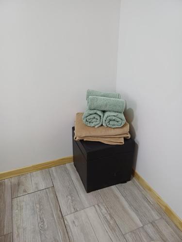 a pile of towels sitting on top of a table at Dorado Stey in Río Grande