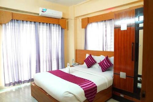 Katil atau katil-katil dalam bilik di Agile Orchid service residence TRX by KL