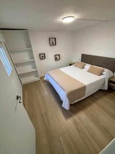 Postel nebo postele na pokoji v ubytování Apartamento Playa Vigo