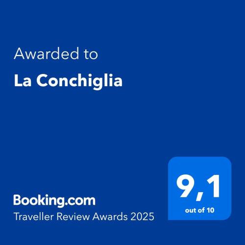a blue text box with the words awarded to la constitution at La Conchiglia in Torre Ovo